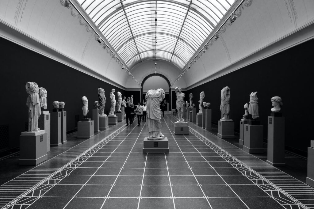 grayscale photo of statues